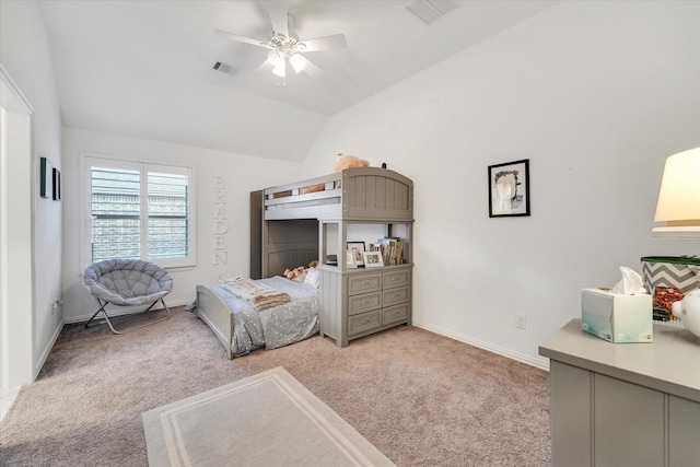 carpeted bedroom with ceiling fan and lofted ceiling