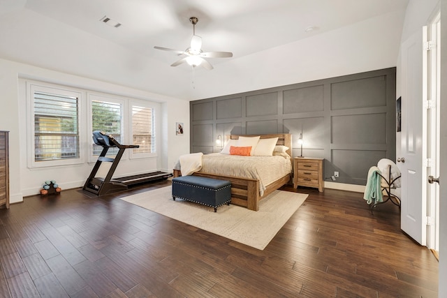 bedroom featuring dark hardwood / wood-style floors and ceiling fan