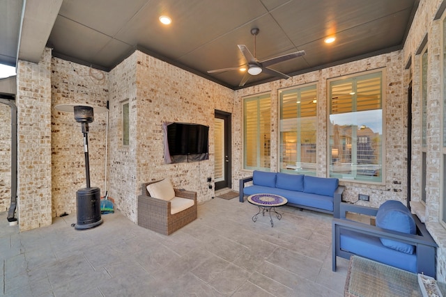 view of patio featuring ceiling fan and an outdoor hangout area