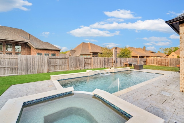 view of pool featuring an in ground hot tub, pool water feature, and a patio