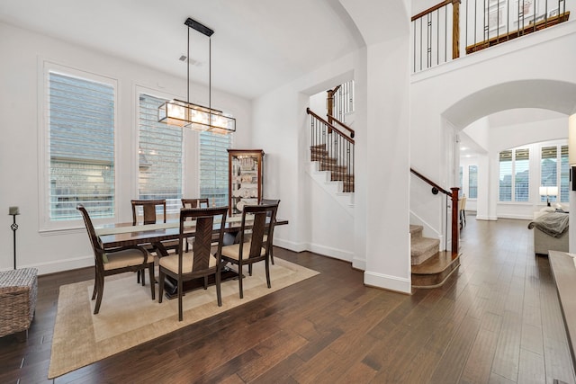 dining area featuring dark hardwood / wood-style floors