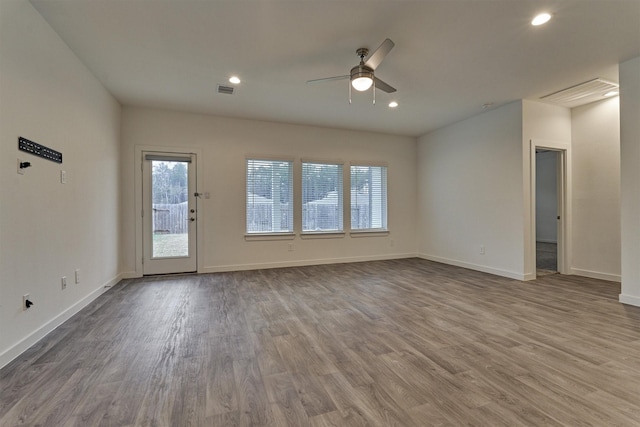 unfurnished room featuring hardwood / wood-style flooring and ceiling fan