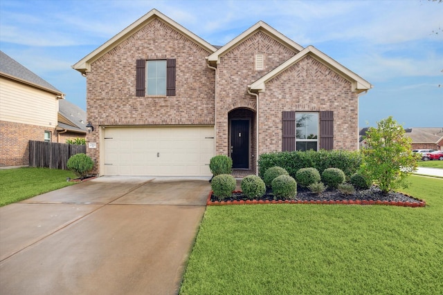 view of front property with a garage and a front lawn