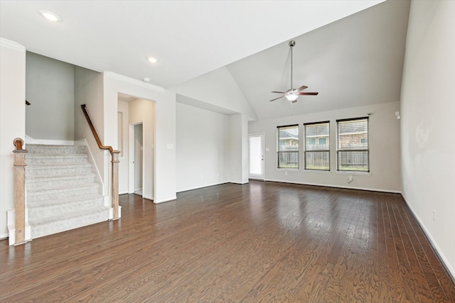 unfurnished living room with ceiling fan, lofted ceiling, and dark hardwood / wood-style flooring