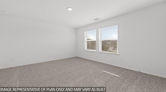 unfurnished room featuring carpet