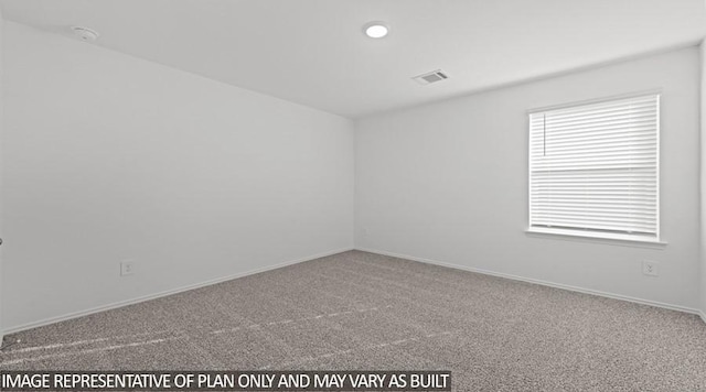 spare room with carpet flooring