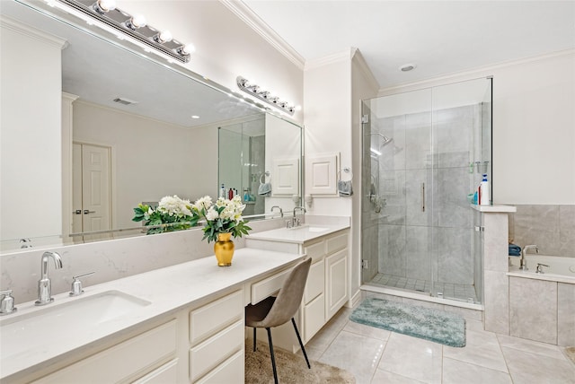 bathroom with tile patterned flooring, ornamental molding, independent shower and bath, and vanity