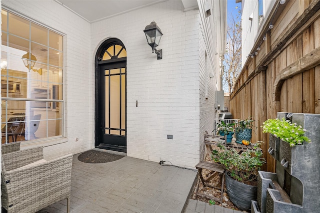 entrance to property featuring a porch