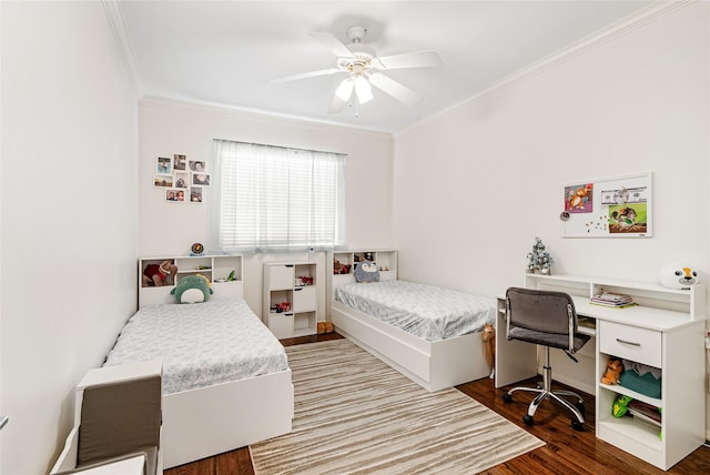 bedroom with crown molding, hardwood / wood-style flooring, and ceiling fan