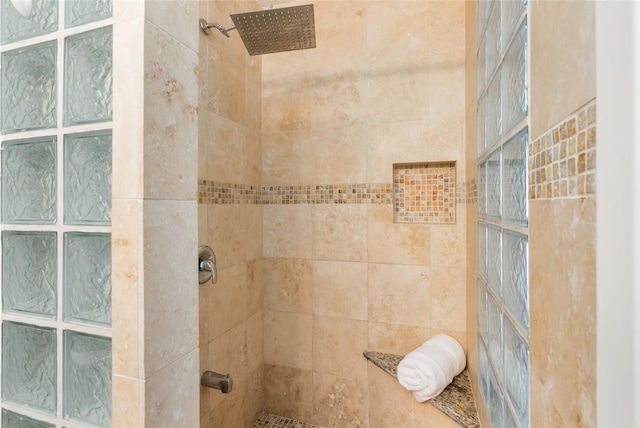 bathroom featuring tiled shower