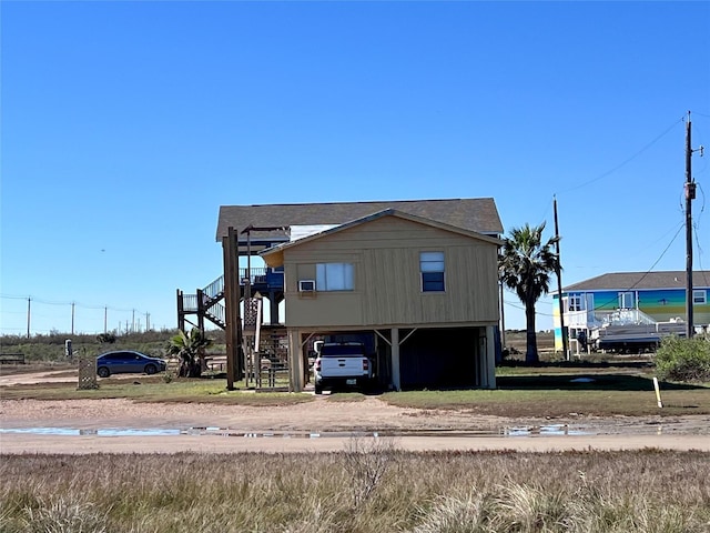 view of front of home with a carport