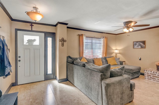 living room featuring ornamental molding and ceiling fan