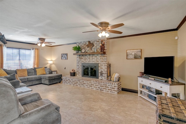 living room with a brick fireplace, crown molding, and ceiling fan