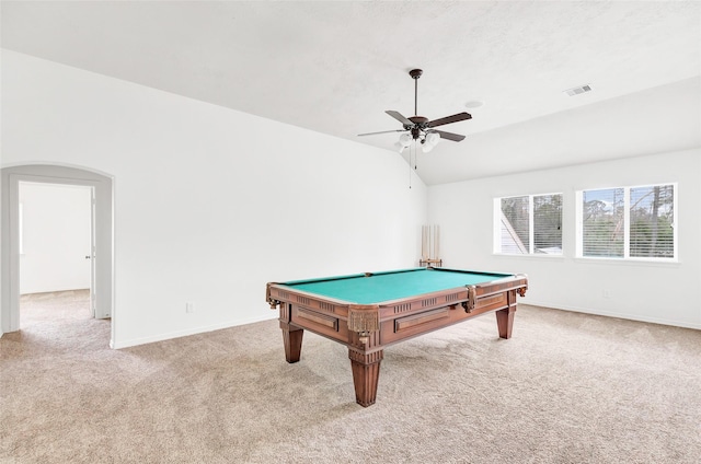 recreation room with pool table, vaulted ceiling, light colored carpet, and ceiling fan