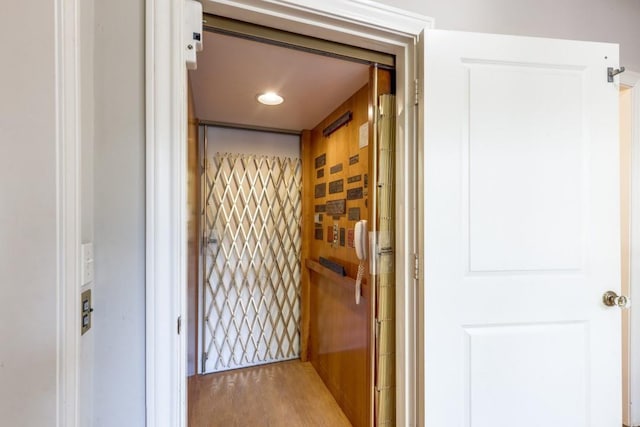 36111 Post Oak Cir, Magnolia, TX 77355 - corridor featuring wood finished floors