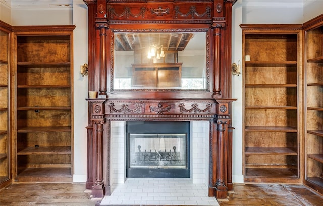 interior details featuring hardwood / wood-style flooring and ornamental molding