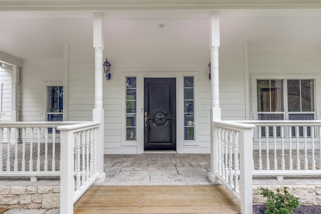 36111 Post Oak Cir, Magnolia, TX 77355 - doorway to property with covered porch