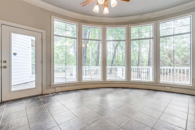 36111 Post Oak Cir, Magnolia, TX 77355 - empty room featuring a ceiling fan, crown molding, and plenty of natural light