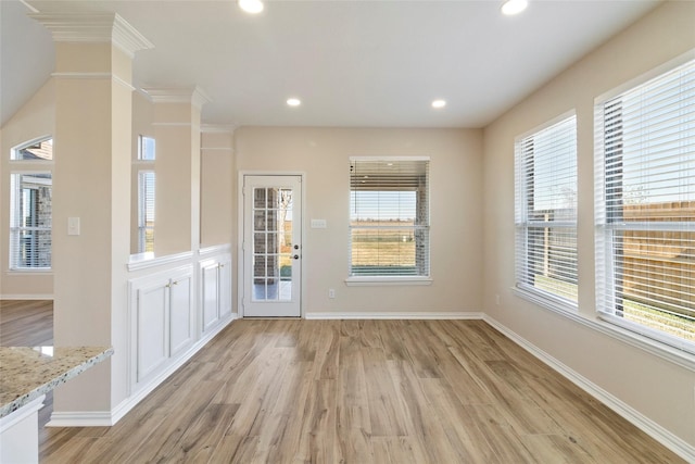 entrance foyer with light hardwood / wood-style floors