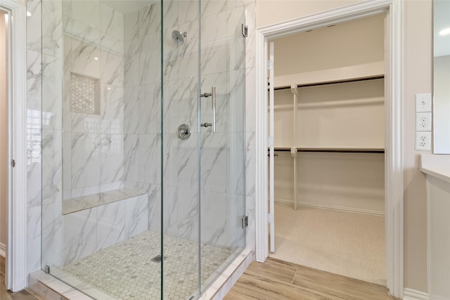 bathroom with an enclosed shower