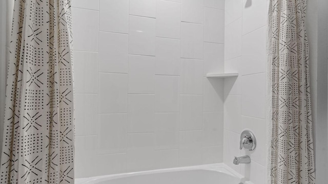 bathroom with shower / bath combination with curtain