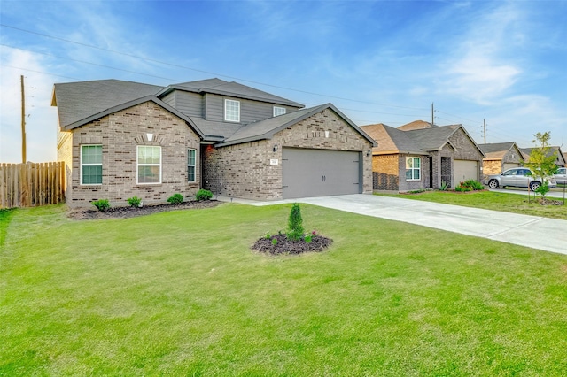 view of front of property featuring a garage and a front lawn