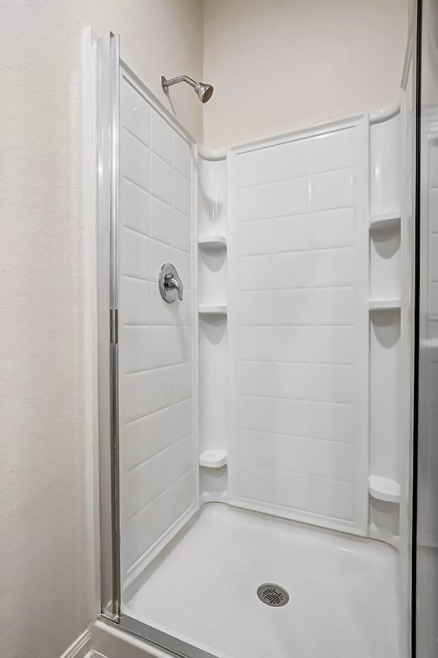 bathroom with walk in shower