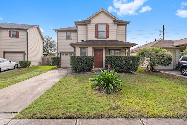 view of property featuring a garage and a front lawn