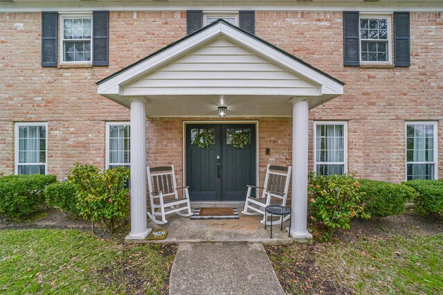 entrance to property with a porch