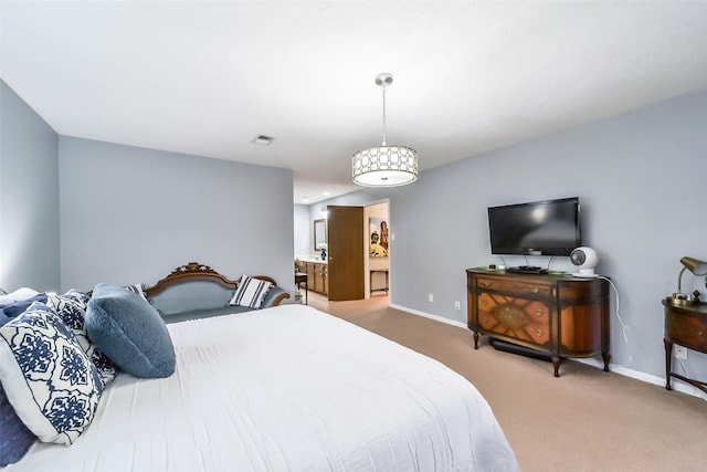 carpeted bedroom with baseboards and visible vents