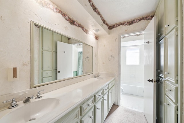 full bathroom with vanity, tiled shower / bath combo, tile patterned floors, and toilet