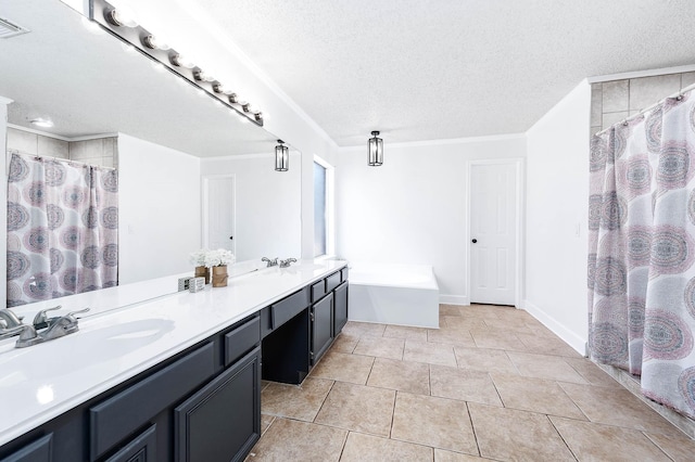 bathroom with vanity, separate shower and tub, tile patterned floors, and a textured ceiling