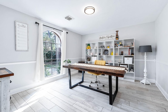 home office featuring light wood-type flooring