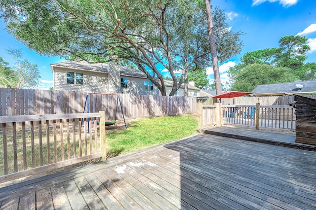 wooden deck with a yard