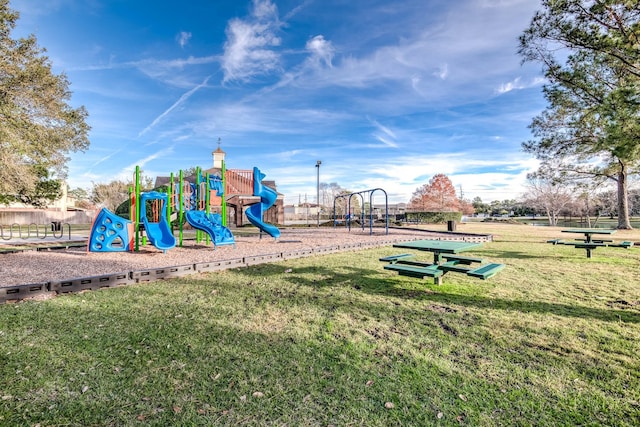 view of playground featuring a yard