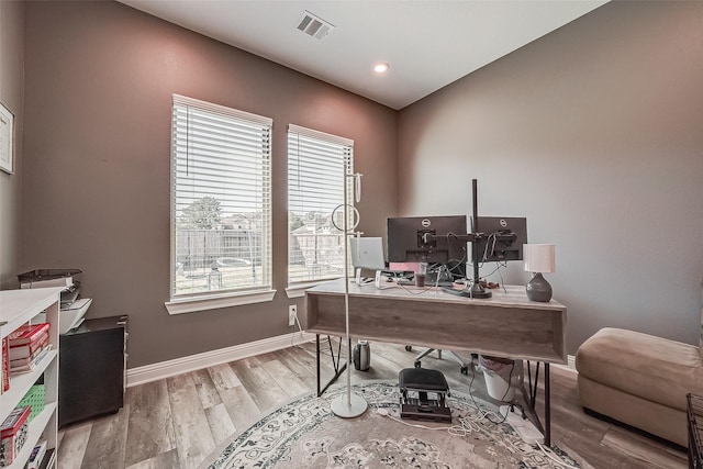 home office featuring hardwood / wood-style flooring