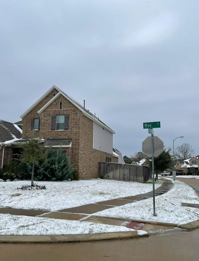 view of snow covered property