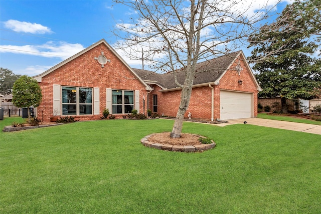 view of front of house featuring a garage and a front yard