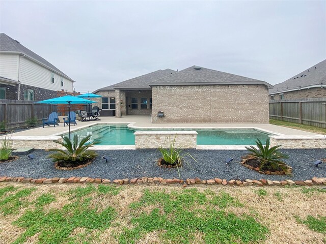 view of pool featuring a patio area