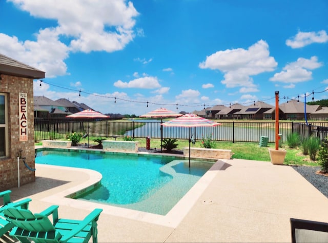 view of swimming pool with a patio, a fenced backyard, and a fenced in pool