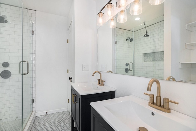 bathroom with vanity and walk in shower