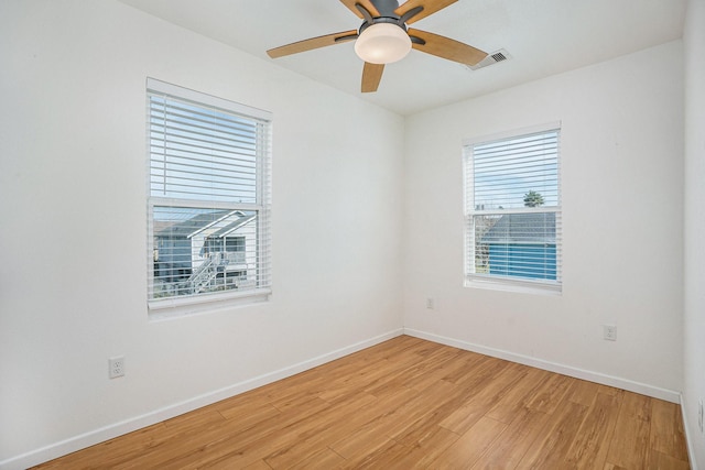 unfurnished room with light hardwood / wood-style floors and ceiling fan