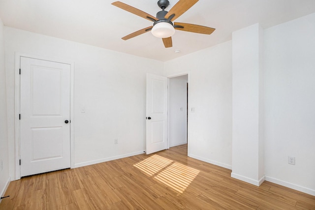 unfurnished room with light hardwood / wood-style flooring and ceiling fan