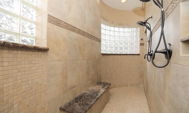 bathroom featuring tiled shower