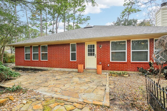 view of front of home with a patio