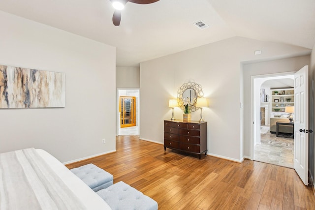 bedroom with visible vents, baseboards, and light wood-style floors