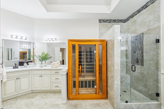 full bathroom with a sauna, vanity, and a shower stall