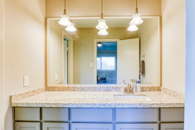 bathroom featuring vanity and ceiling fan