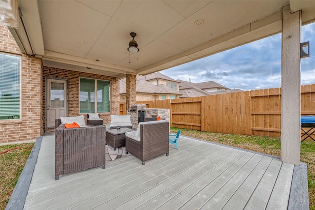 deck featuring outdoor lounge area