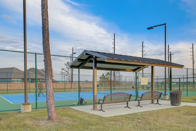 exterior space featuring tennis court